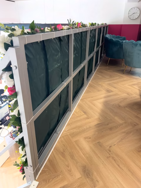 🌸 Most floral installations only need to look good from the front.
This one was different.
Installed on a mezzanine level overlooking the office below, the reverse side of the installation is fully visible from the meeting room and breakout space behind it. That meant we couldn’t simply focus on the front-facing design.
To create a professional finish from every angle, we added a clean green backing and carefully finished the rear of the installation so it complements the workspace just as well as the floral display itself.
When a feature is part of a permanent interior, every viewpoint matters. 👀
#CommercialInteriors #FloralInstallation #OfficeDesign #ArtificialFlowers #BehindTheScenes